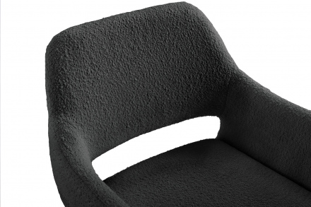 SalesFever Armlehnstuhl mit Rücken Cut-Out Bouclé Stoff Anthrazit, Kufengestell aus mattschwarz pulverbeschichteten Metall
